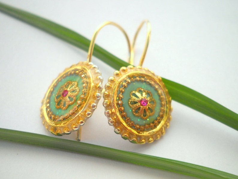 Ohrhänger mit zarter Blüte Stern Ohrhänger mit zarter Blüte Stern